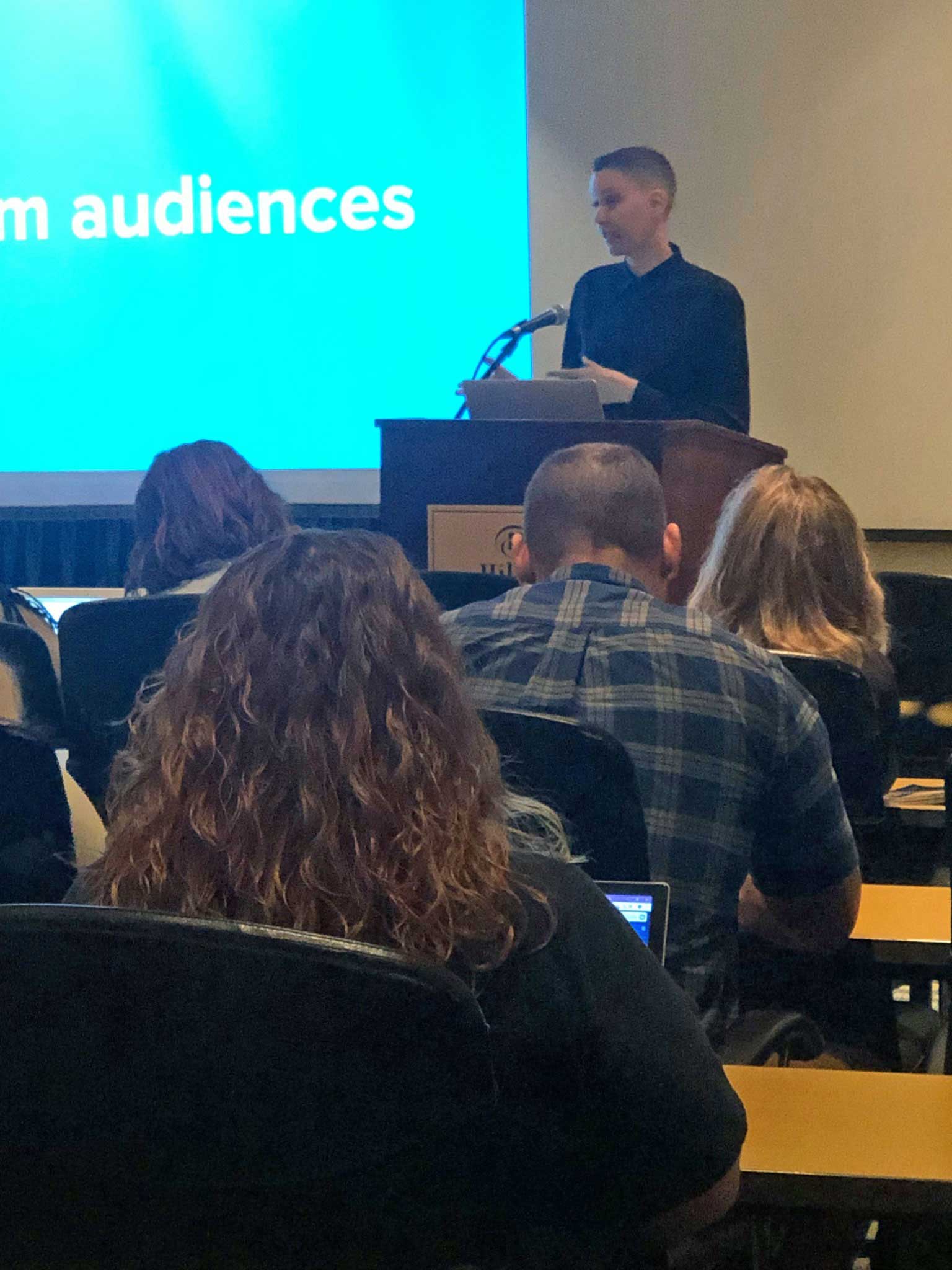 Kat Love, copywriter for therapists, speaking at the group practice exchange conference